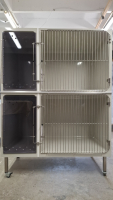 Low Stress 6 - 2 Large cages each with an adjoining toilet cage and lockable portholes